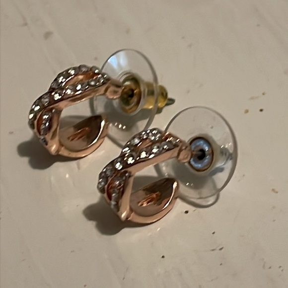 1” rose gold tone infinity stud earrings with 18 prong set crystals - Picture 8 of 16